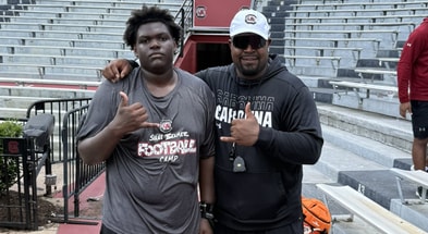 Class of 2027 defensive lineman Ronald "Trey" Moore with South Carolina defensive line coach Travian Robertson. Photo credit: Trey Moore | @trey19moore on Twitter/X