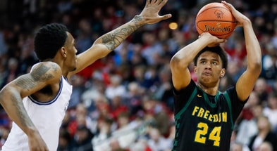 Freedom High School's Donovan Davis (24) shoots the ball against Milwaukee Academy of Science during the WIAA Division 3 state championship game on Saturday, March 22, 2025, at the Kohl Center in Madison, Wis. Milwaukee Academy of Science won the game, 57-54. Tork Mason/USA TODAY NETWORK-Wisconsin