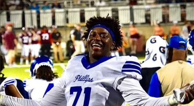 Four-star OT Claude Mpouma