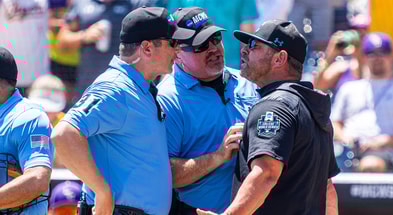 College World Series Coastal Carolina Kevin Schnall LSU ejection umpire