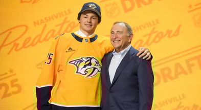 Incoming Michigan State freshman Ryker Lee is selected as the 26th overall pick to the Nashville Predators in the first round of the 2025 NHL Draft at Peacock Theater. - Kirby Lee, USA TODAY Sports