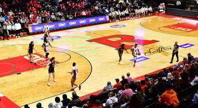 Rutegrs Women's Basketball guard Awa Sidibe dribbles the ball up the floor against Army in the WNIT.