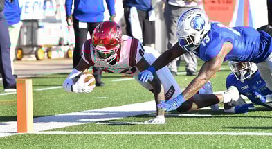Reginald Vick Jr. (left) playing for Virginia Union.
