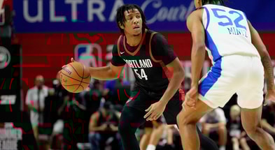 Jul 15, 2024; Las Vegas, NV, USA; Portland Trail Blazers guard Kennedy Chandler (54) controls the ball against Philadelphia 76ers guard Judah Mintz (52) during the first half at Thomas &amp; Mack Center. Mandatory Credit: Lucas Peltier-USA TODAY Sports