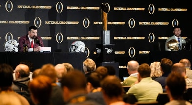 Ohio State coach Ryan Day, Notre Dame coach Marcus Freeman and the National Championship Trophy