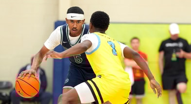 July 15, 2025; North Augusta, South Carolina, USA; Oakland Soldiers Jason Crowe Jr. (5) dribbles as Team Final RJ Smith (3) defends during the Oakland Soldiers and Team Final game at Nike EYBL Peach Jam at Riverview Park Activities Center. The Oakland Soldiers won 86-75. Mandatory Credit: Katie Goodale - Augusta Chronicle/USA TODAY NETWORK