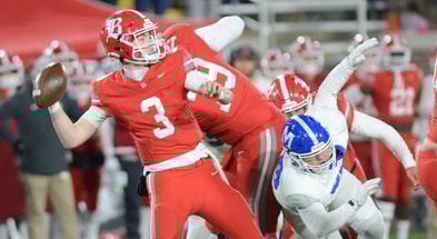 Briggs Cherry passes for Baylor School in a Tennessee high school football game.