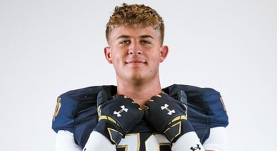 Grayson McKeogh poses on his Notre Dame official visit.