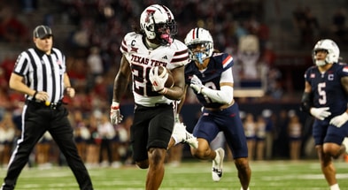 Texas Tech running back Tahj Brooks scoring against Arizona