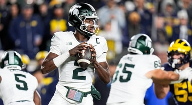 Michigan State quarterback Aidan Chiles looks before making a pass against Michigan during the first half at Michigan Stadium in Ann Arbor on Saturday, Oct. 26, 2024. - Junfu Han, USA TODAY Sports