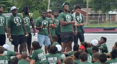 Michigan State DE Jalen Thompson addresses campers at his youth camp on Saturday at Harper Woods High School (photo by Kenny Jordan for SpartanMag.com).