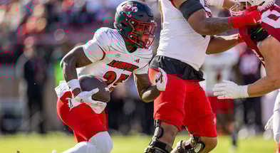 Nov 16, 2024; Stanford, California, USA; Louisville Cardinals running back Isaac Brown (25) runs the ball during the first quarter against the Stanford Cardinal at Stanford Stadium. Mandatory Credit: Bob Kupbens-Imagn Images
