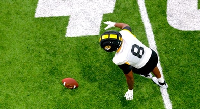 Damon Wilson lines up to fall on a loose ball