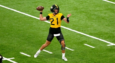 Sam Horn throws a pass