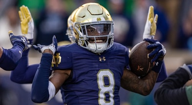 Adon Shuler celebrates interception against Virginia in 2024.