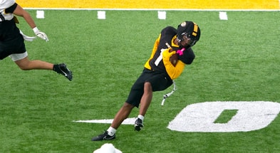 Donovan Olugbode spins away from a tackle during a drill