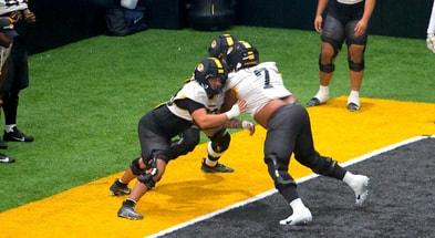 Chris McClellan tries to get through a double-team block