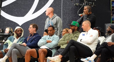 July 19, 2025; North Augusta, South Carolina, USA; NBA star Carmelo Anthony (center right) talks to University of Kentucky basketball coach Mark Pope (right) during the Team Why Not and Team CP3 game at the Nike EYBL Peach Jam at Riverview Park Activity Center. Team Why Not won 66-63. Mandatory Credit: Katie Goodale - Augusta Chronicle/USA TODAY NETWORK