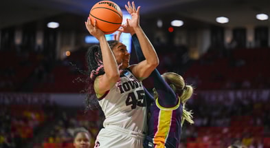ESPN named Hannah Stuelke as a player to watch in 2025-26.