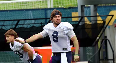 West Virginia quarterback Nicco Marchiol waits for the snap