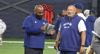 Georgia Tech assistant coaches Kyle Pope and Jess Simpson