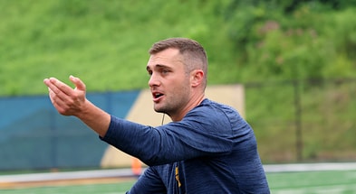 West Virginia wide receivers coach Ryan Garrett at practice