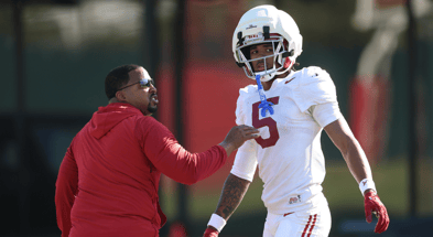 Alabama DB coach Maurice Linguist and CB Dijon Lee
