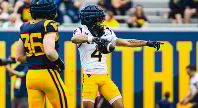 West Virginia wide receiver Cam Vaughn catching the TD pass