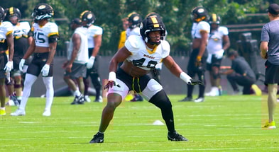 Josiah Trotter watches the start of a drill