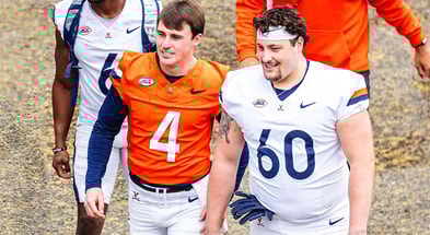 UVa QB Chandler Morris (left) and OL Drake Metcalf