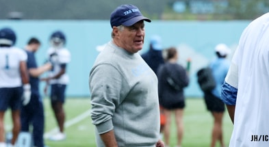 Bill Belichick coaching at North Carolina football's training camp.