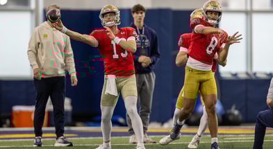 Notre Dame QBs coach Gino Guidugli with quarterbacks CJ Carr (13) and Kenny Minchey (8)