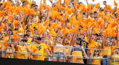 West Virginia Mountaineer fans cheer during the game