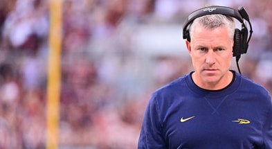 Sep 14, 2024; Starkville, Mississippi, USA; Toledo Rockets head coach Jason Candle walks down the field during the first quarter of the game against the Mississippi State Bulldogs at Davis Wade Stadium at Scott Field. Mandatory Credit: Matt Bush-Imagn Images