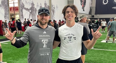 2028 DB Nolan Hawkins with Texas Tech safeties coach Rob Greene