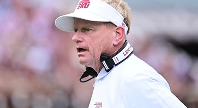 Aug 31, 2024; Starkville, Mississippi, USA; Eastern Kentucky Colonels head coach Walt Wells stands on the sideline during the first quarter of the game against the Mississippi State Bulldogs at Davis Wade Stadium at Scott Field. Mandatory Credit: Matt Bush-Imagn Images