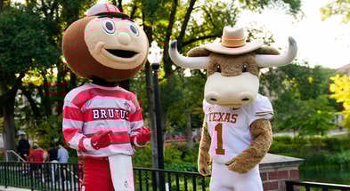 Ohio State mascot, Brutus, and University of Texas mascot, Hook 'Em, interact during a filming of the Joel Klatt Show on Ohio State's campus on Aug. 28, 2025. The Buckeyes' kick off the 2025 season against the Longhorns at Ohio Stadium on Aug. 30. (© Adam Cairns/Columbus Dispatch / USA TODAY NETWORK via Imagn Images)