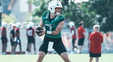 Louisville Cardinals quarterback Miller Moss during a morning practice Wednesday, July 30, 2025. Moss transferred from USC. His overall QB rating is 81.4.