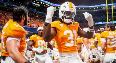 Brianna Paciorka/News Sentinel / USA TODAY NETWORK via Imagn Images | Tennessee defensive lineman Caleb Herring (31) dances in celebration after the Aflac Kickoff Game between the Volunteers and Syracuse held at Mercedes-Benz Stadium in Atlanta, Ga., on August 30, 2025.