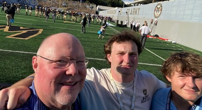 Army commit Malcolm Roberts with dad and younger brother A