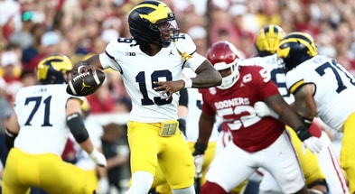 Sep 6, 2025; Norman, Oklahoma, USA; Michigan Wolverines quarterback Bryce Underwood (19) looks to pass downfield against the Oklahoma Sooners during the first half at Gaylord Family-Oklahoma Memorial Stadium. Mandatory Credit: Kevin Jairaj-Imagn Images