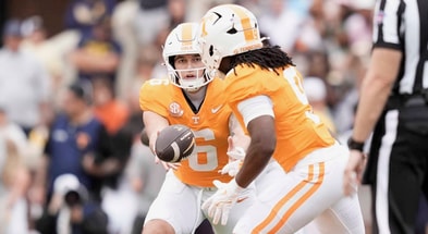 Caitie McMekin/News Sentinel / USA TODAY NETWORK via Imagn Images | Tennessee quarterback Joey Aguilar (6) hands the ball off to Tennessee running back Star Thomas (9) during a college football game between Tennessee and ETSU at Neyland Stadium in Knoxville, Tennessee, on September 6, 2025.