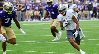 Sep 7, 2024; Seattle, Washington, USA; Eastern Michigan Eagles wide receiver Terry Lockett Jr. (3) carries the ball after a catch against the Washington Huskies during the first half at Alaska Airlines Field at Husky Stadium. Mandatory Credit: Steven Bisig-Imagn Images