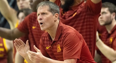 USC coach Eric Musselman cheers his team during the first half against Oregon