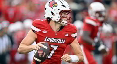 Sep 5, 2025; Louisville, Kentucky, USA; Louisville Cardinals quarterback Miller Moss (7) looks to pass against the James Madison Dukes during the first quarter at L&N Federal Credit Union Stadium. Mandatory Credit: Jamie Rhodes-Imagn Images