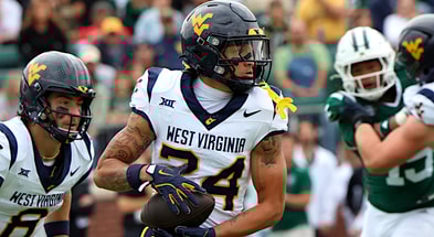 West Virginia wide receiver Rodney Gallagher with the carry