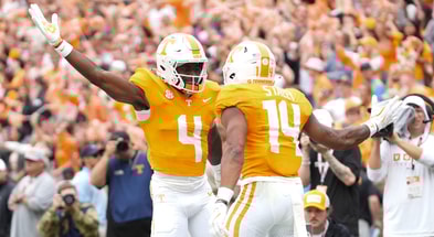 Caitie McMekin/News Sentinel / USA TODAY NETWORK via Imagn Images | Tennessee wide receivers Mike Matthews (4) and Braylon Staley (14) celebrate Staley's touchdown during an NCAA college football game against ETSU on September 6, 2025, in Knoxville, Tennessee.