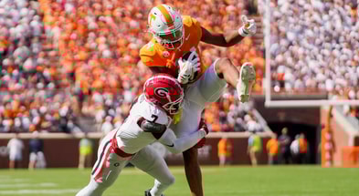 Angelina Alcantar/News Sentinel / USA TODAY NETWORK via Imagn Images | Georgia defensive back Daniel Harris (7) tackles Tennessee wide receiver Braylon Staley (14) as Staley catches the ball before a NCAA football game between Tennessee and Georgia at Neyland Stadium in Knoxville, Tennessee, on September 13, 2025.