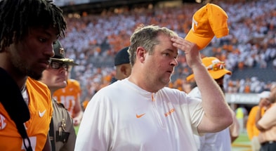 Saul Young/News Sentinel / USA TODAY NETWORK via Imagn Images | Tennessee head coach Josh Heupel walks off the field after the loss to Georgia in an NCAA college football game on September 13, 2025, Knoxville, Tennessee.