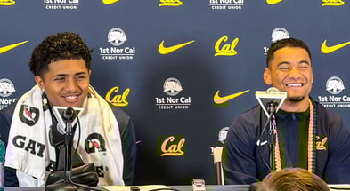 Cal quarterback Jaron-Keawe Sagapolutele and receiver Jacob De Jesus